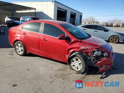 Czwarte zdjęcie samochodu z boku: 2014 CHEVROLET SONIC LT VIN:1G1JC5SH5E4207746 - miniatura