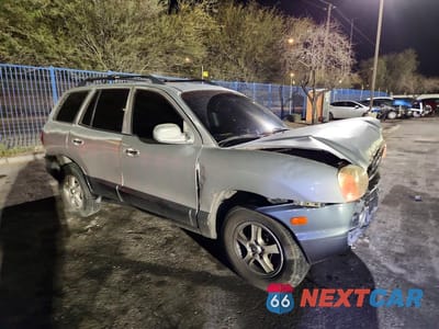 Czwarte zdjęcie samochodu z boku: 2004 HYUNDAI SANTA FE GLS VIN:KM8SC13E44U678838 - miniatura