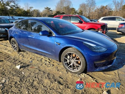 Czwarte zdjęcie samochodu z boku: 2023 TESLA MODEL 3 VIN:5YJ3E1EA2PF555548 - miniatura