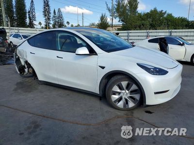 Czwarte zdjęcie samochodu z boku: 2023 TESLA MODEL Y VIN:7SAYGDEE5PF771191 - miniatura