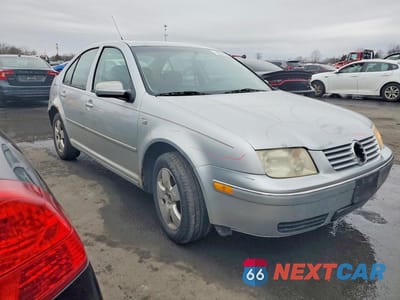 Czwarte zdjęcie samochodu z boku: 2004 VOLKSWAGEN JETTA GLS VIN:3VWSK69M54M041378 - miniatura