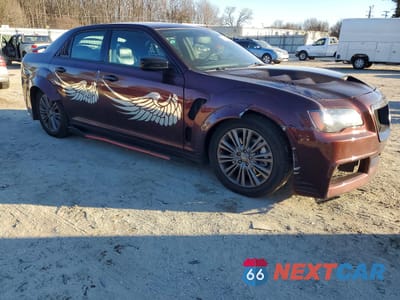 Czwarte zdjęcie samochodu z boku: 2014 CHRYSLER 300C VARVATOS VIN:2C3CCAJGXEH240346 - miniatura