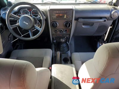 Zdjęcie 8 z 13 samochodu: 2010 JEEP WRANGLER SPORT VIN:1J4AA2D13AL154941 - miniatura
