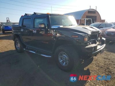 Czwarte zdjęcie samochodu z boku: 2006 HUMMER H2 SUT VIN:5GRGN22U36H121156 - miniatura
