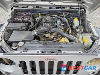 Zdjęcie 12 z 13 samochodu: 2011 JEEP WRANGLER SPORT VIN:1J4AA2D18BL636113 - miniatura
