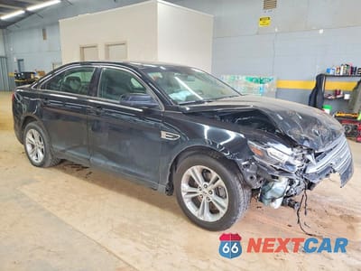 Czwarte zdjęcie samochodu z boku: 2017 FORD TAURUS SEL VIN:1FAHP2E85HG126209 - miniatura