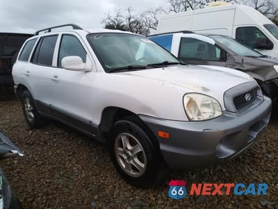 Czwarte zdjęcie samochodu z boku: 2003 HYUNDAI SANTA FE GLS VIN:KM8SC13D03U478013 - miniatura