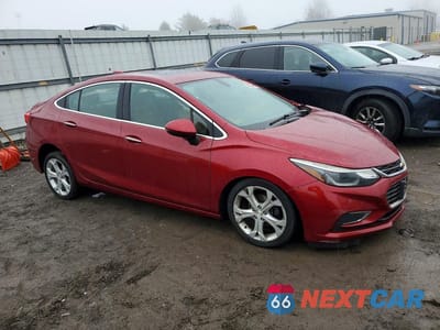 Czwarte zdjęcie samochodu z boku: 2017 CHEVROLET CRUZE PREMIER VIN:3G1BF5SM2HS565870 - miniatura