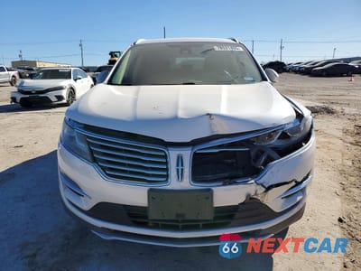 Piąte zdjęcie samochodu w środku: 2015 LINCOLN MKC VIN:5LMCJ1A96FUJ20943 - miniatura