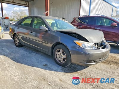 Czwarte zdjęcie samochodu z boku: 2002 TOYOTA CAMRY LE V6 VIN:4T1BF32KX2U535979 - miniatura