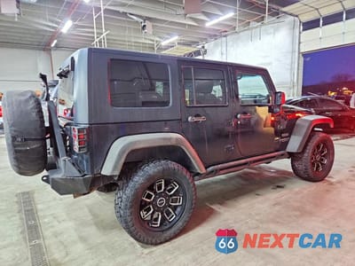 Trzecie zdjęcie samochodu z tyłu: 2010 JEEP WRANGLER UNLIMITED SPORT VIN:1J4BA3H15AL139457 - miniatura