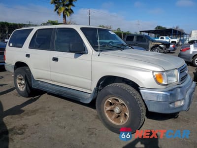 Czwarte zdjęcie samochodu z boku: 1999 TOYOTA 4RUNNER BASE VIN:JT3GM84R9X0046659 - miniatura