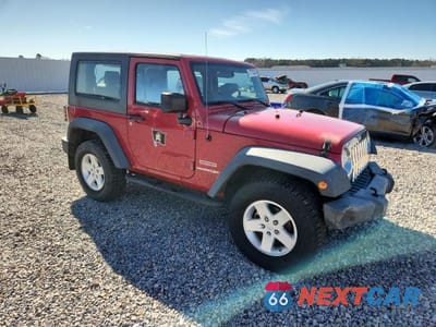 Czwarte zdjęcie samochodu z boku: 2010 JEEP WRANGLER SPORT VIN:1J4AA2D1XAL139272 - miniatura