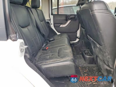 Zdjęcie 10 z 12 samochodu: 2015 JEEP WRANGLER UNLIMITED SAHARA VIN:1C4BJWEGXFL742668 - miniatura