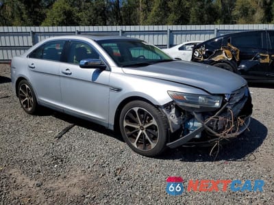 Czwarte zdjęcie samochodu z boku: 2015 FORD TAURUS LIMITED VIN:1FAHP2F8XFG134883 - miniatura