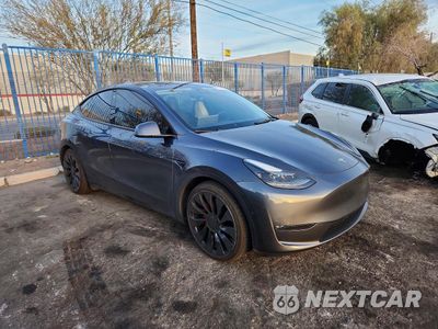 Czwarte zdjęcie samochodu z boku: 2022 TESLA MODEL Y VIN:7SAYGDEF0NF404883 - miniatura