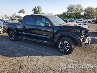 Czwarte zdjęcie samochodu z boku: 2022 TOYOTA TACOMA DOUBLE CAB VIN:3TMBZ5DN9NM033956 - miniatura