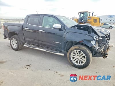 Czwarte zdjęcie samochodu z boku: 2020 GMC CANYON SLT VIN:1GTG6DEN5L1169194 - miniatura