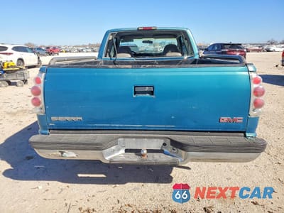 Zdjęcie 6 z 13 samochodu: 1998 GMC SIERRA VIN:1GTEC19W5WE536755 - miniatura