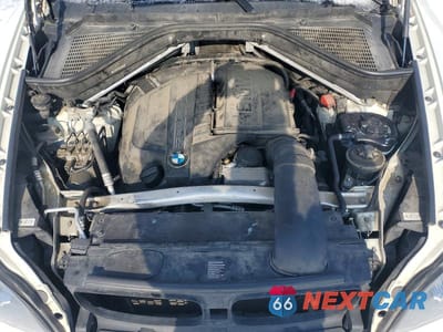 Zdjęcie 12 z 13 samochodu: 2013 BMW X5 XDRIVE35I VIN:5UXZV4C55D0E08492 - miniatura