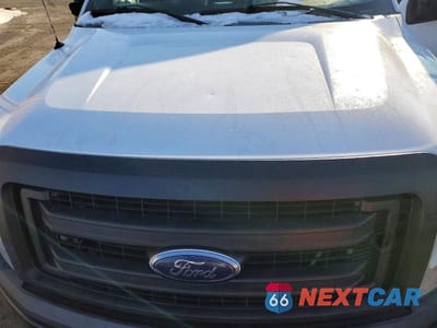 Zdjęcie 11 z 12 samochodu: 2014 FORD F150 VIN:1FTMF1CM4EKD62977 - miniatura