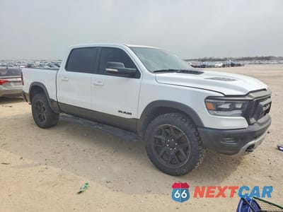 Czwarte zdjęcie samochodu z boku: 2020 RAM 1500 REBEL VIN:1C6SRFLT0LN170753 - miniatura