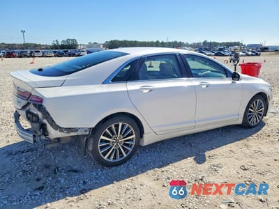 Trzecie zdjęcie samochodu z tyłu: 2019 LINCOLN MKZ VIN:3LN6L5A9XKR604410 - miniatura