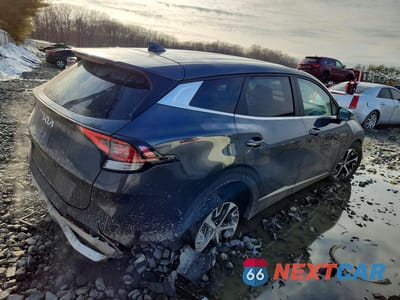 Trzecie zdjęcie samochodu z tyłu: 2023 KIA SPORTAGE EX VIN:5XYK33AF1PG073211 - miniatura