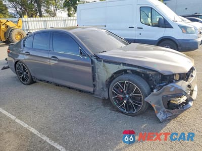 Czwarte zdjęcie samochodu z boku: 2022 BMW M550XI VIN:WBA13BK04NCJ54220 - miniatura