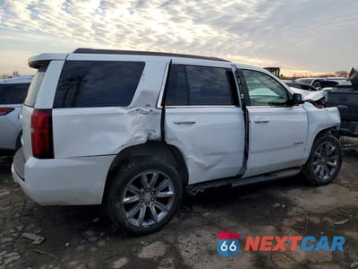 Trzecie zdjęcie samochodu z tyłu: 2019 CHEVROLET TAHOE K1500 LT VIN:1GNSKBKC6KR133647 - miniatura