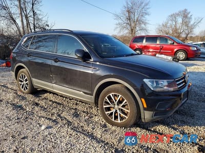 Czwarte zdjęcie samochodu z boku: 2018 VOLKSWAGEN TIGUAN SE VIN:3VV3B7AX7JM199818 - miniatura