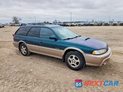 Czwarte zdjęcie samochodu z boku: 1999 SUBARU LEGACY OUTBACK VIN:4S3BG685XX7605085 - miniatura