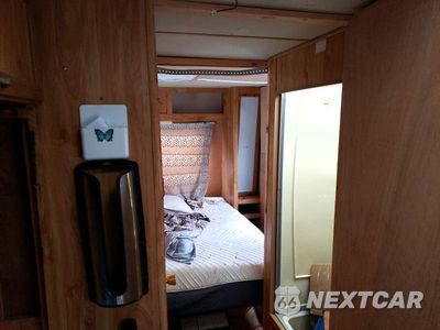 Zdjęcie 6 z 10 samochodu: 1991 FORD ECONOLINE E350 CUTAWAY VAN VIN:1FDKE30G2MHA88495 - miniatura