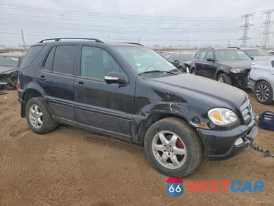 Czwarte zdjęcie samochodu z boku: 2003 MERCEDES-BENZ ML 350 VIN:4JGAB57E03A431297 - miniatura
