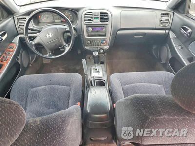 Zdjęcie 8 z 11 samochodu: 2002 HYUNDAI SONATA BASE VIN:KMHWF25HX2A719980 - miniatura