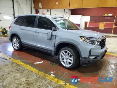 Czwarte zdjęcie samochodu z boku: 2024 HONDA PASSPORT EXL VIN:5FNYF8H58RB023802 - miniatura