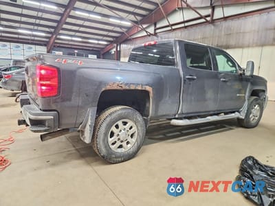 Trzecie zdjęcie samochodu z tyłu: 2015 CHEVROLET SILVERADO K2500 HEAVY DUTY LT VIN:1GC1KVEG8FF166080 - miniatura