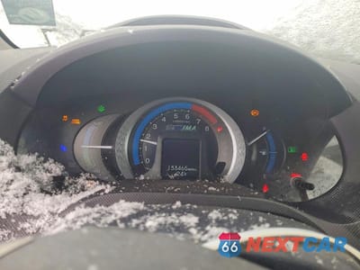 Zdjęcie 9 z 11 samochodu: 2010 HONDA INSIGHT EX VIN:JHMZE2H75AS036793 - miniatura