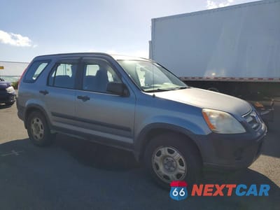 Czwarte zdjęcie samochodu z boku: 2006 HONDA CR-V LX VIN:JHLRD68506C003893 - miniatura