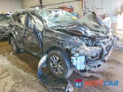 Czwarte zdjęcie samochodu z boku: 2018 TOYOTA RAV4 HYBRID XLE VIN:JTMRJREV9JD247928 - miniatura