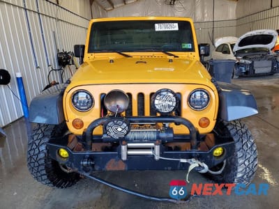 Piąte zdjęcie samochodu w środku: 2012 JEEP WRANGLER SPORT VIN:1C4AJWAG2CL123091 - miniatura