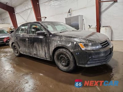 Czwarte zdjęcie samochodu z boku: 2016 VOLKSWAGEN JETTA S VIN:3VW267AJ9GM391211 - miniatura