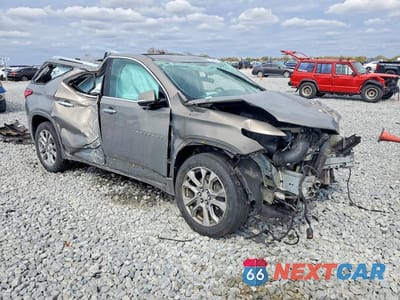 Czwarte zdjęcie samochodu z boku: 2019 CHEVROLET TRAVERSE PREMIER VIN:1GNEVKKW4KJ156647 - miniatura