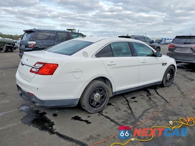 Trzecie zdjęcie samochodu z tyłu: 2014 FORD TAURUS POLICE INTERCEPTOR VIN:1FAHP2MK6EG122078 - miniatura