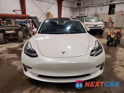 Piąte zdjęcie samochodu w środku: 2021 TESLA MODEL 3 VIN:5YJ3E1EC2MF926480 - miniatura