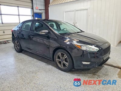 Czwarte zdjęcie samochodu z boku: 2017 FORD FOCUS SE VIN:1FADP3FE7HL275849 - miniatura