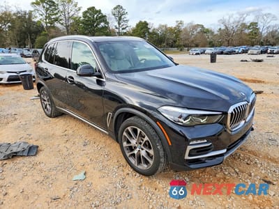 Czwarte zdjęcie samochodu z boku: 2021 BMW X5 XDRIVE40I VIN:5UXCR6C03M9G17509 - miniatura