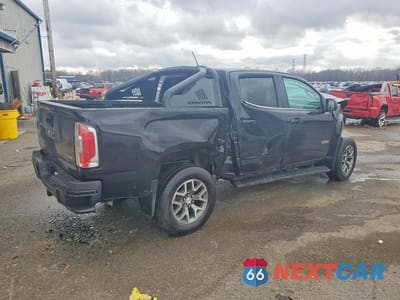 Trzecie zdjęcie samochodu z tyłu: 2018 GMC CANYON SLT VIN:1GTG6DEN0J1285058 - miniatura