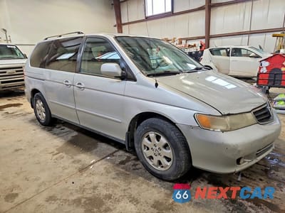 Czwarte zdjęcie samochodu z boku: 2003 HONDA ODYSSEY EXL VIN:2HKRL18083H004460 - miniatura