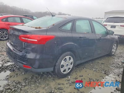 Trzecie zdjęcie samochodu z tyłu: 2016 FORD FOCUS S VIN:1FADP3E29GL270898 - miniatura